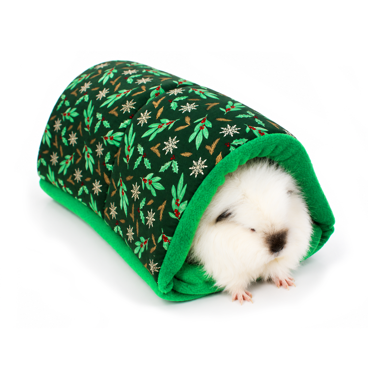 Festive holly Christmas snuggle tunnel for guinea pigs with forest green cotton outer, emerald green anti-pill fleece lining and a fluffy white guinea pig inside