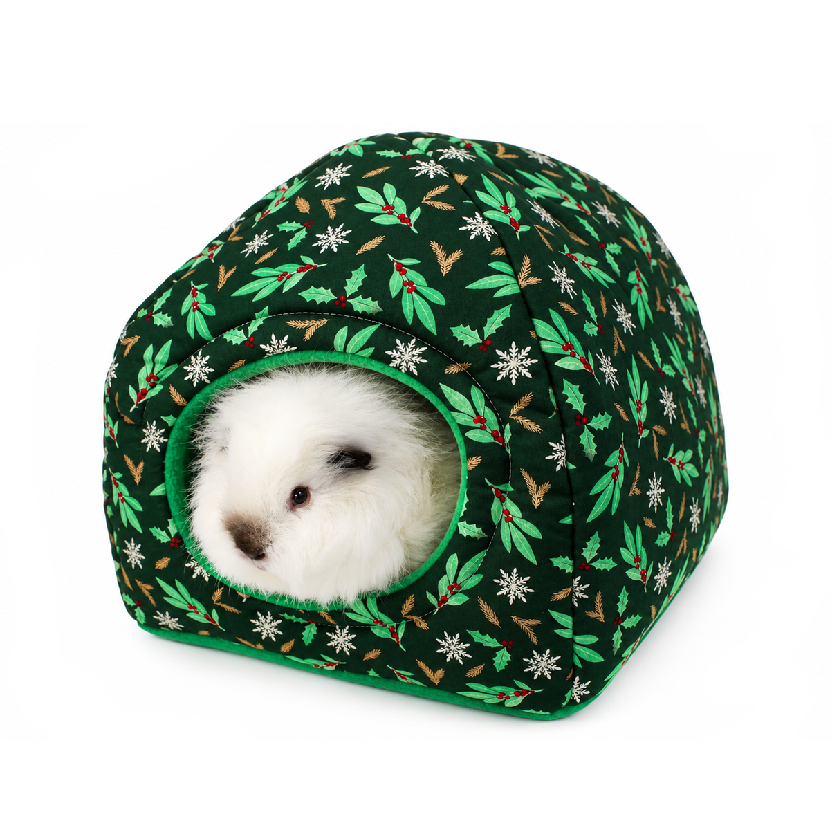 Handmade Christmas guinea pig hidey house in green holly print fabric with red berries, white snowflakes and golden foliage
