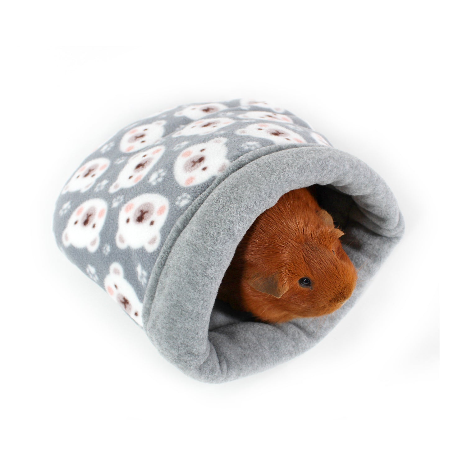 Gray pet bed with guinea pig pattern and a guinea pig peeking out on a white background