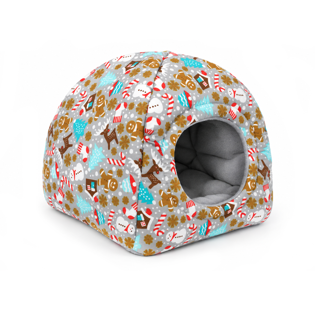 Angled view of a handmade grey gingerbread Christmas hidey house for guinea pigs with a round entrance and festive cotton fabric