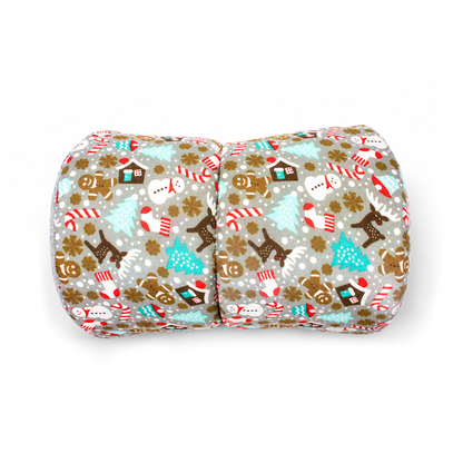 Top view of a handmade grey Christmas gingerbread squish tunnel for guinea pigs with a festive printed cotton outer