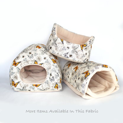 Steampunk Butterfly Cuddle Cup Bed, view showing the other fleece guinea pig accessories available in this collection
