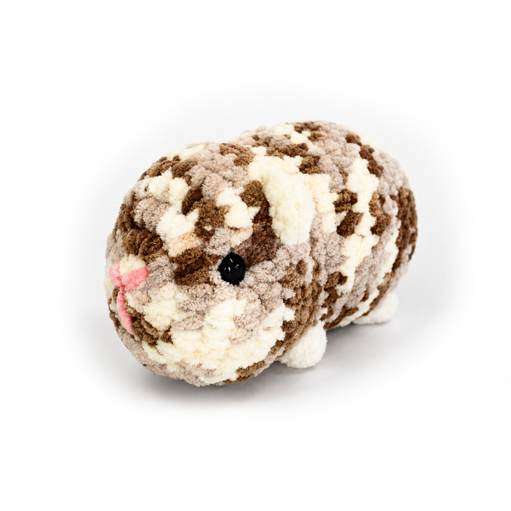 Hand crocheted Halloumi guinea pig plush side view