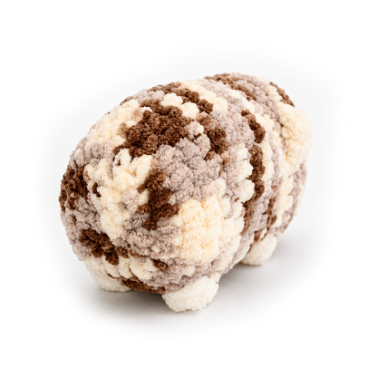 Hand crocheted Halloumi guinea pig plush side view