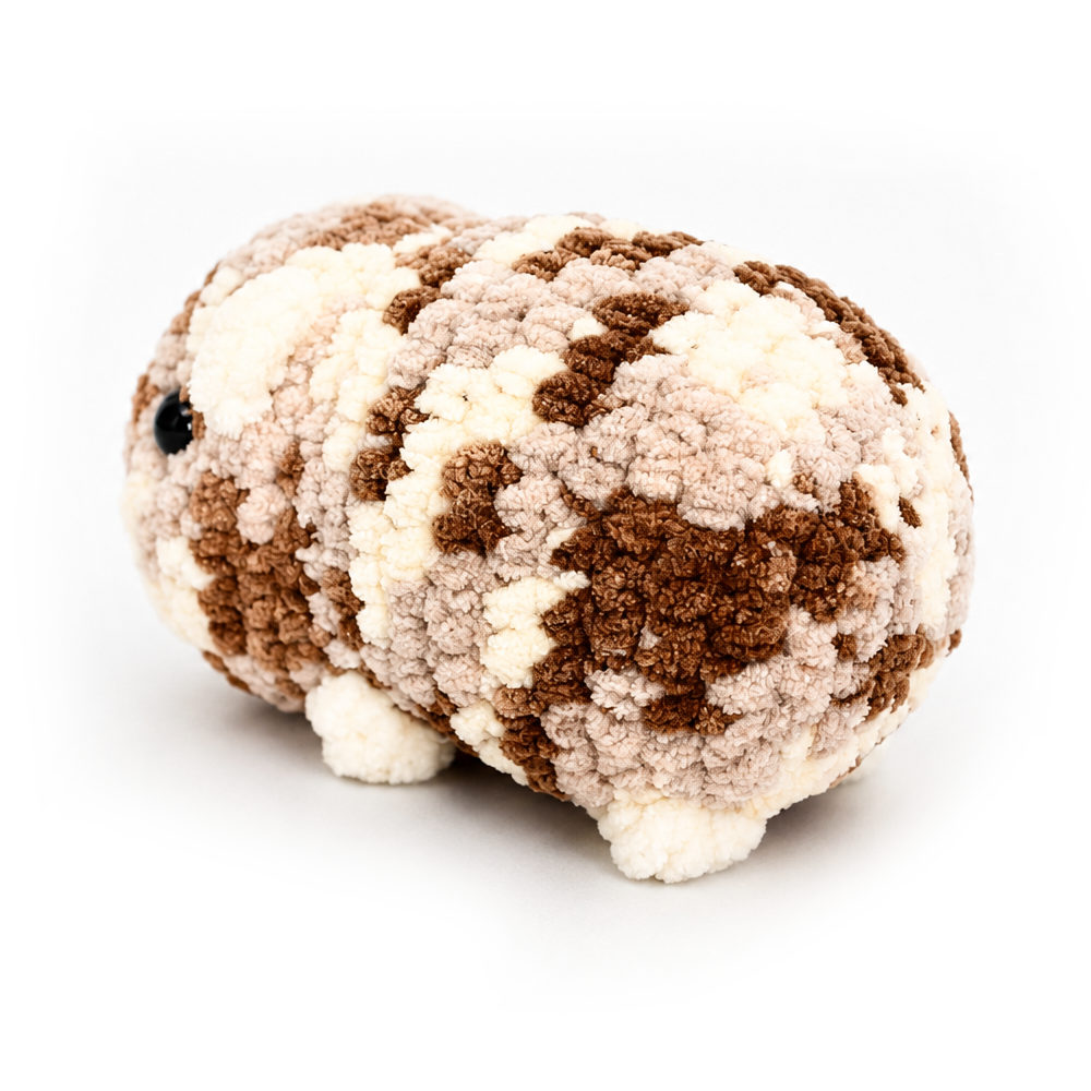 Hand crocheted Halloumi guinea pig plush three quarter view