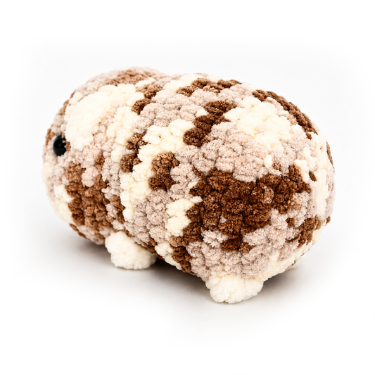 Hand crocheted Halloumi guinea pig plush three quarter view
