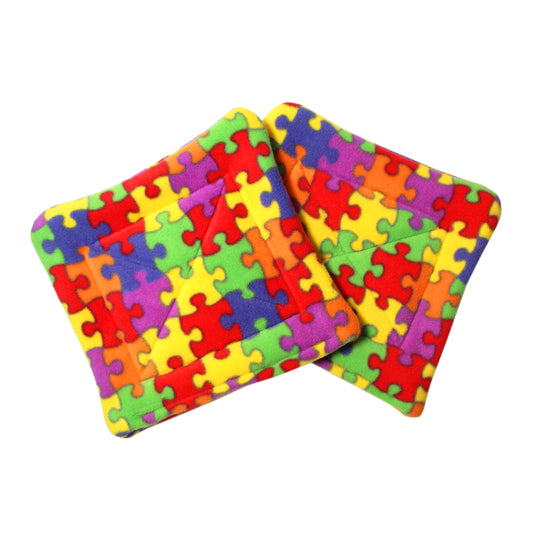 Pair Of Square Guinea Pig Rainbow Jigsaw Pee Pads, top view showing both pee mats together