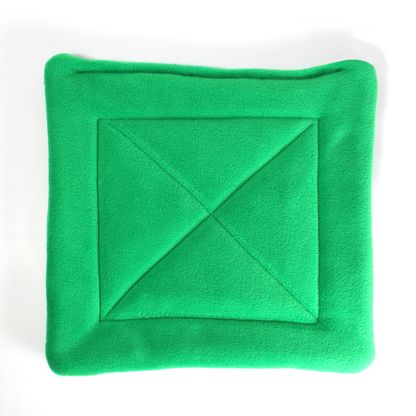 Large Square Emerald Green Pee Pad for Guinea Pigs, top view of the pee mat showing the detail of the pad