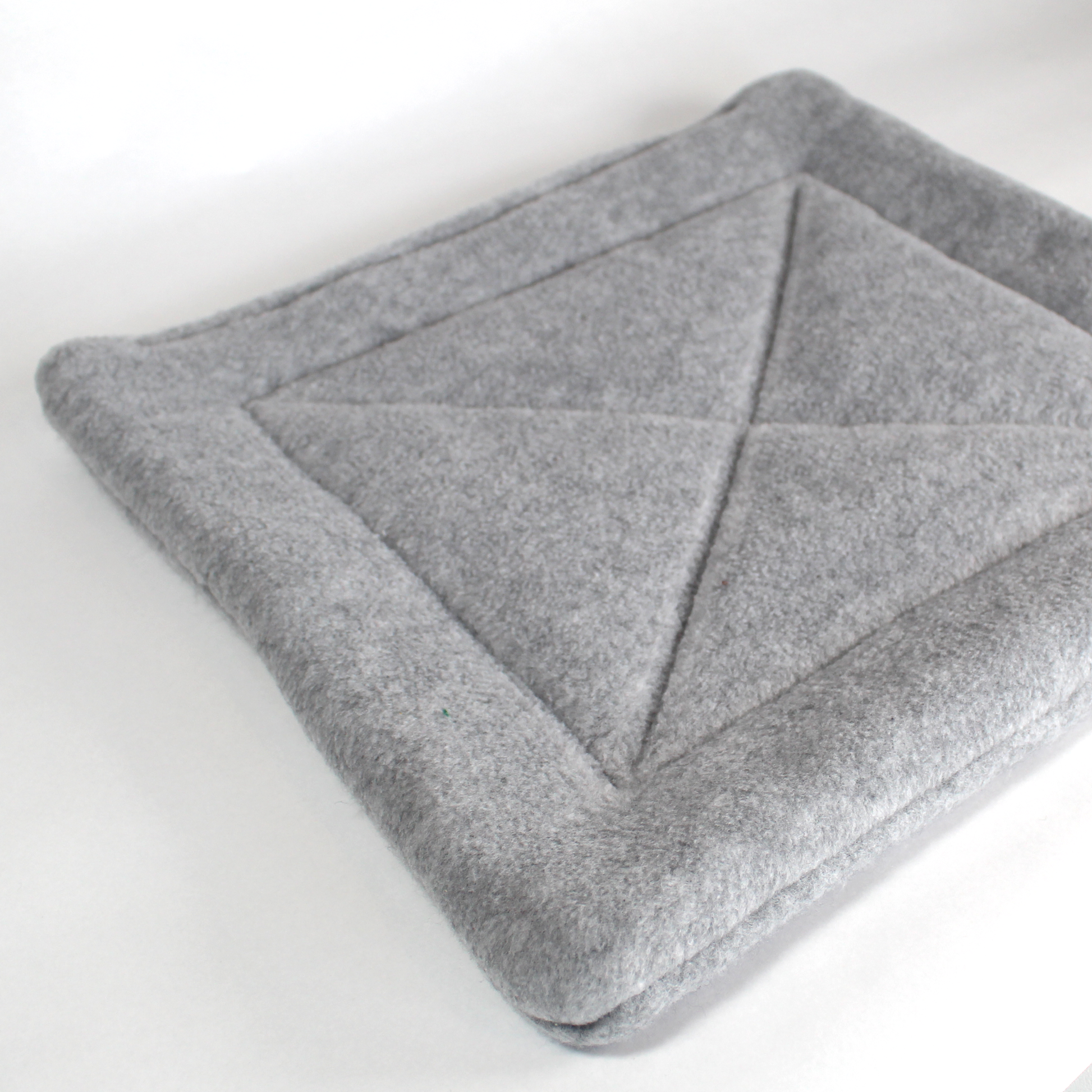 Large Square Grey Pee Pad for Guinea Pigs, front view of the pee pad with out a guinea pig