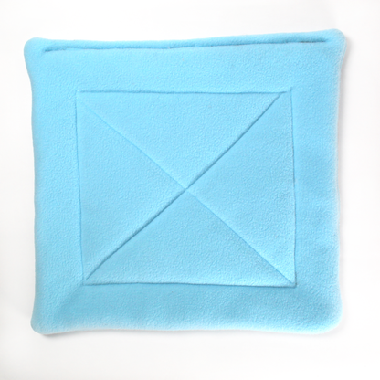 Large Square Light Blue Pee Pad for Guinea Pigs, overhead view of the lap pad for guinea pigs
