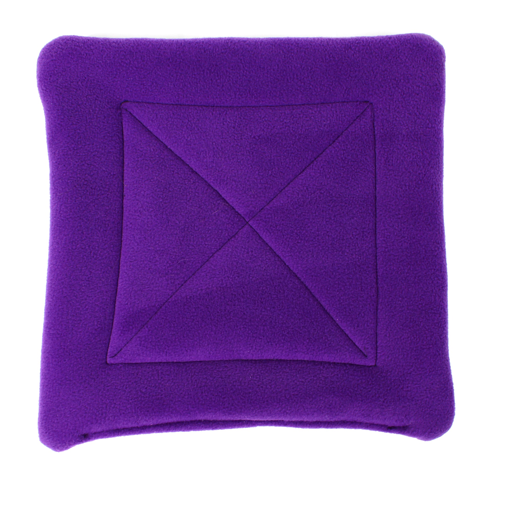 Purple fleece pee pad with a central diamond pattern on a white background