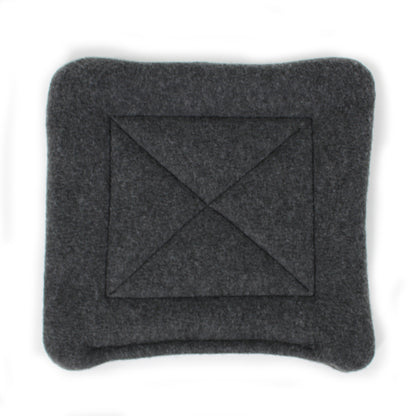Gray square fleece pee mat with a central diamond pattern on a white background