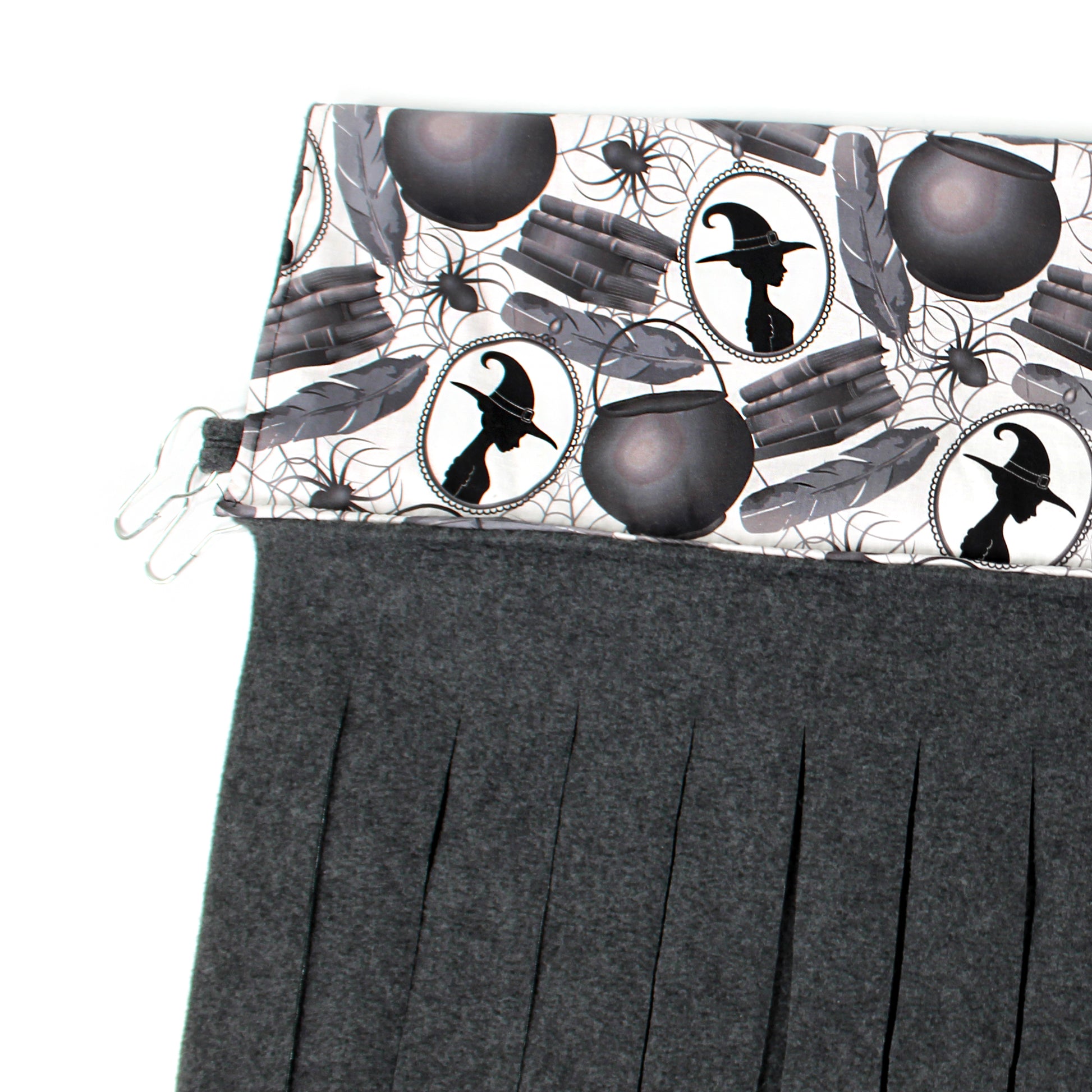 Gray pleated skirt with Halloween-themed pattern on a white background