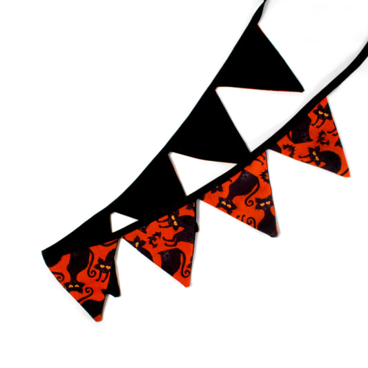 Large Black Cat Orange Bunting, full view of the flags showing the detail of the pattern and the black backing