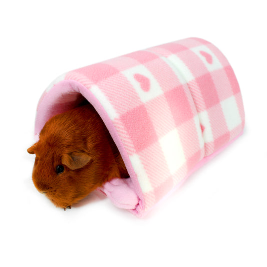 Small animal peeking out from a pink tunnel with white text on a white background