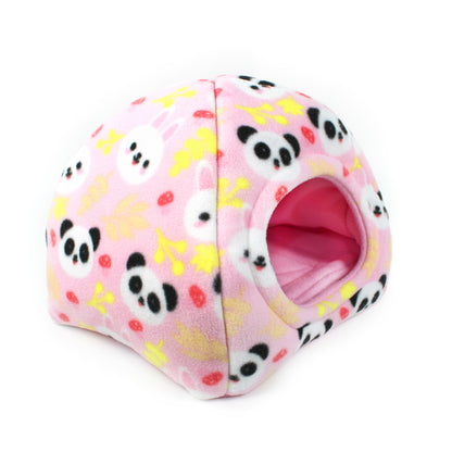 Pink pet house with panda pattern on a white background