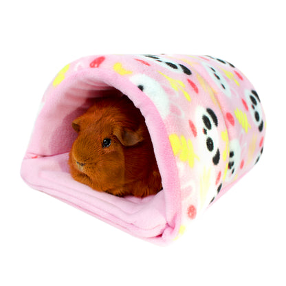 Small animal, likely a guinea pig, peeking out from a colorful tunnel with pink interior