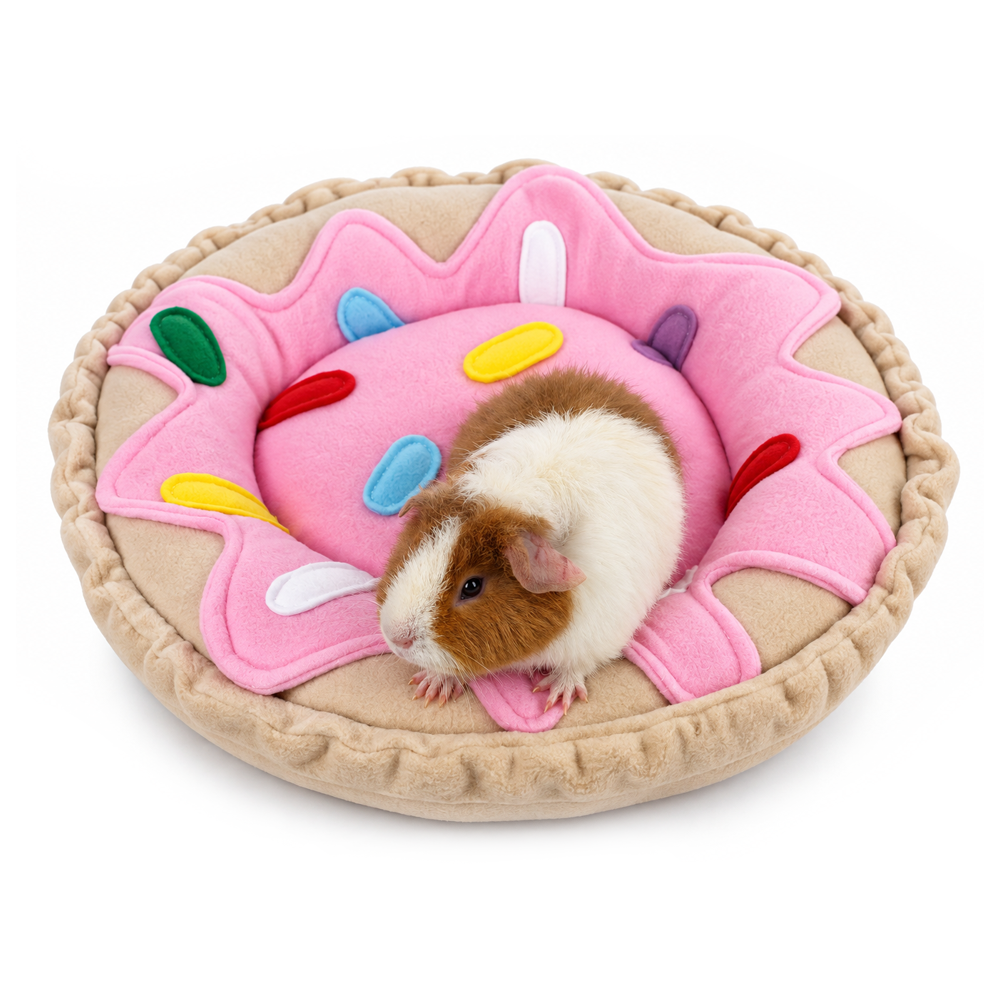 Halloumi Tribute guinea pig doughnut bed with pink icing and colourful sprinkles