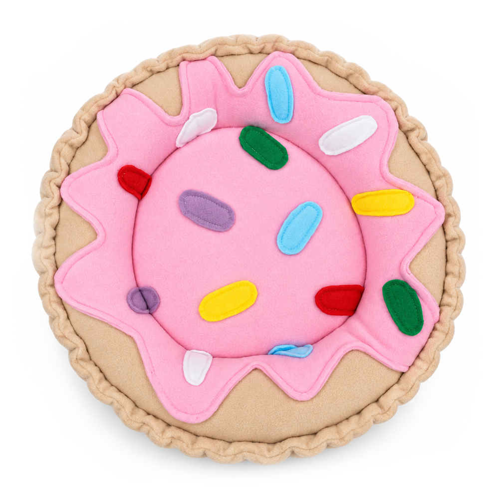 Halloumi Tribute guinea pig doughnut bed with pink icing and colourful sprinkles
