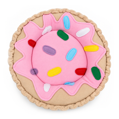 Halloumi Tribute guinea pig doughnut bed with pink icing and colourful sprinkles