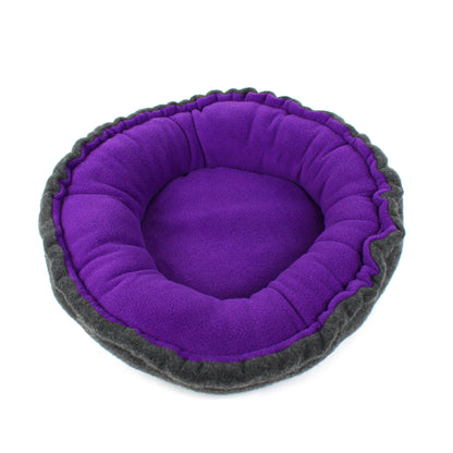 Purple and gray pet bed on a white background