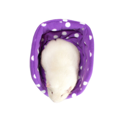 Purple Polka Dot Guinea Pig Cuddle Cup, top view wof the guinea pig bed with a guinea pig inside to give a clear image of the size of the cuddle cup
