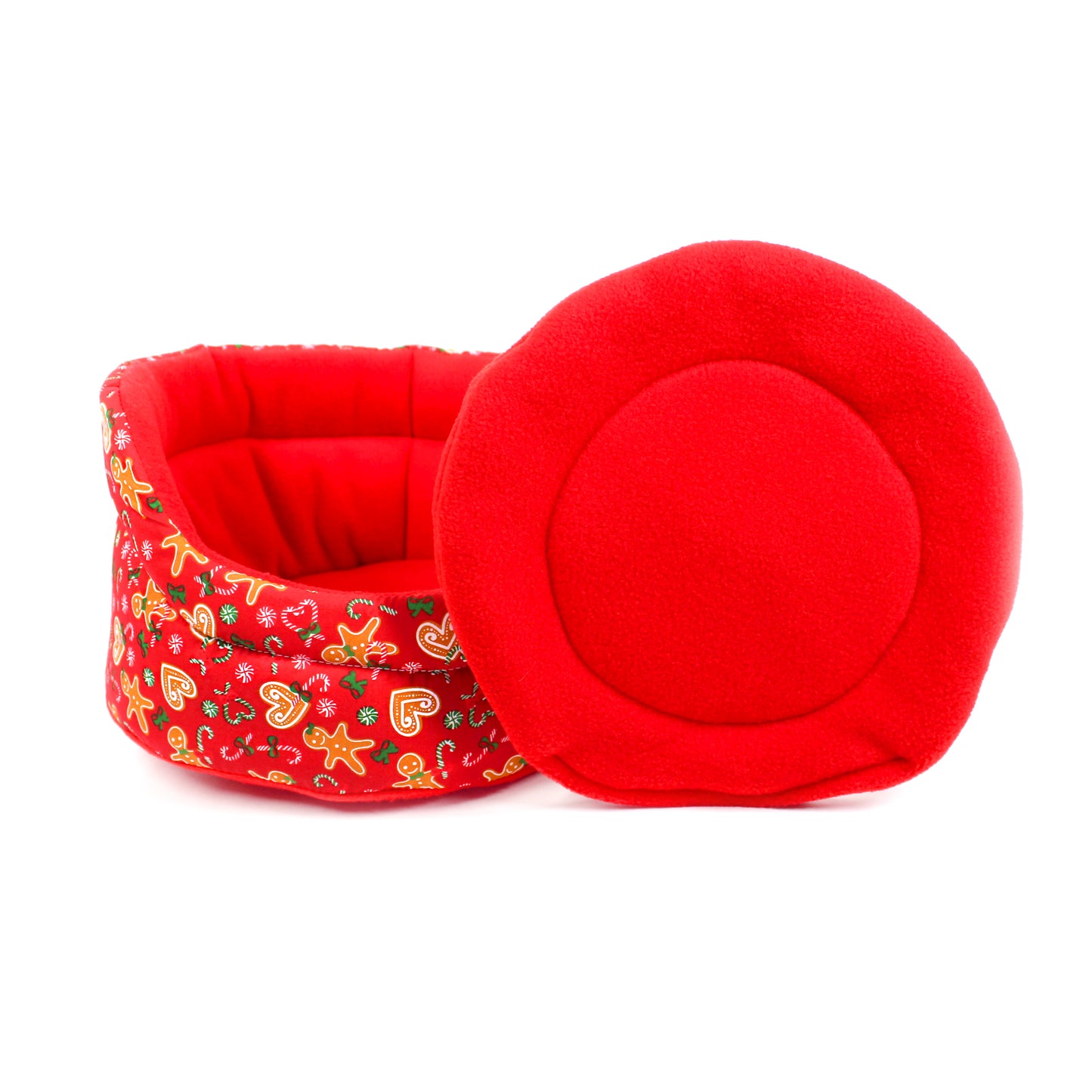 Red pet bed with a floral pattern on a white background