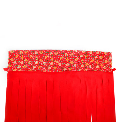 Red curtain with a patterned top section on a white background