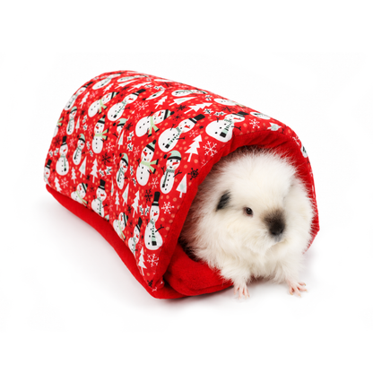 Red snowman Christmas squish tunnel for guinea pigs with red cotton outer, red anti-pill fleece lining and fluffy white guinea pig Swiss Roll peeking out