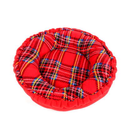 Red plaid pet bed on a white background