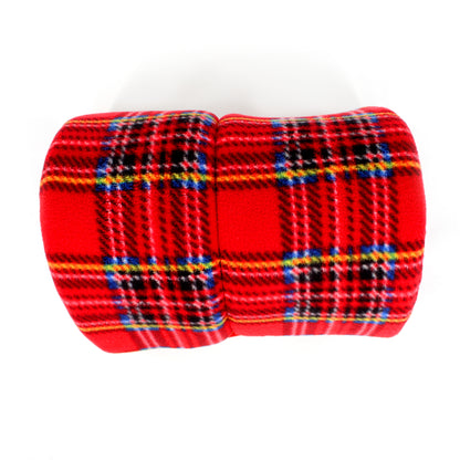 Red plaid fabric roll on a white background