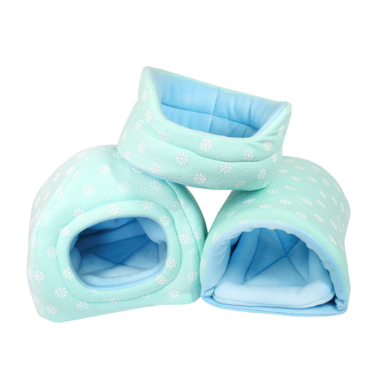 Three light blue pet dens with snowflake pattern on a white background