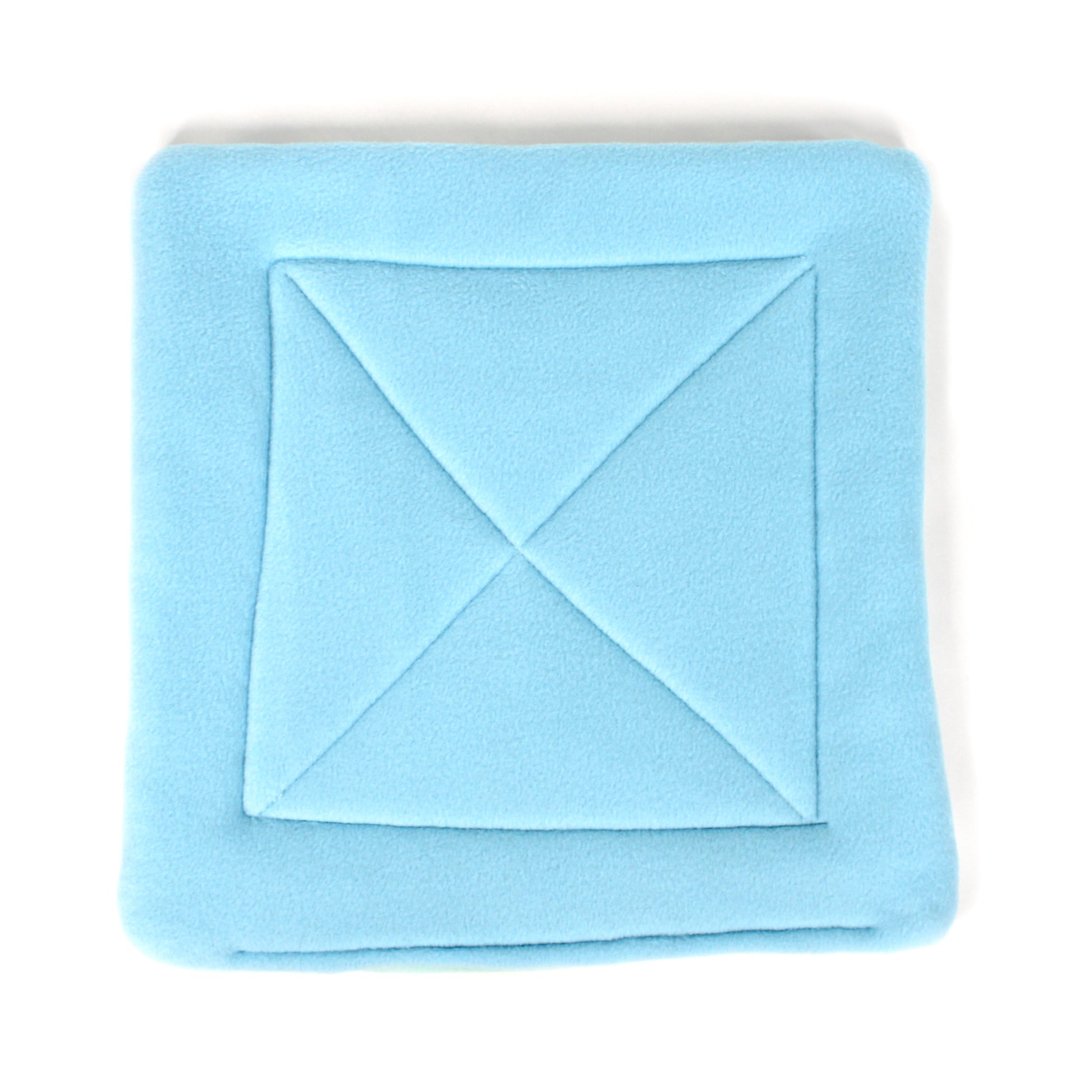 Light blue folded fabric on a white background