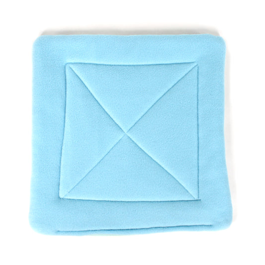 Light blue folded fabric on a white background