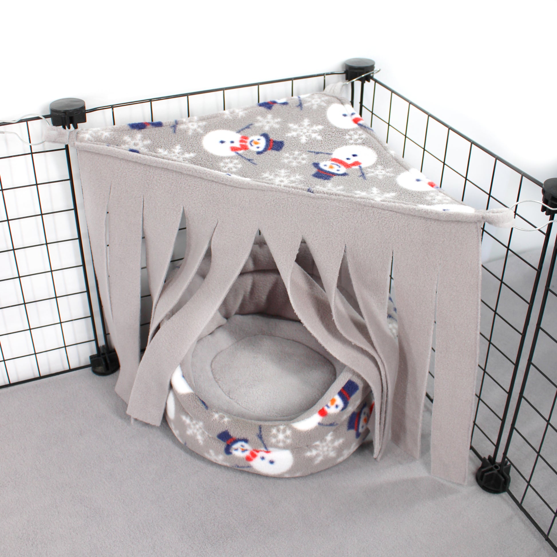 Pet playpen with a fabric cover featuring snowmen designs on a white background.