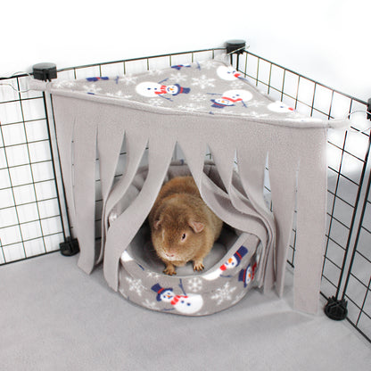 Pet hammock with a small animal inside in a pet cage