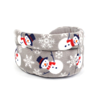 Gray pet bed with snowman pattern on a white background