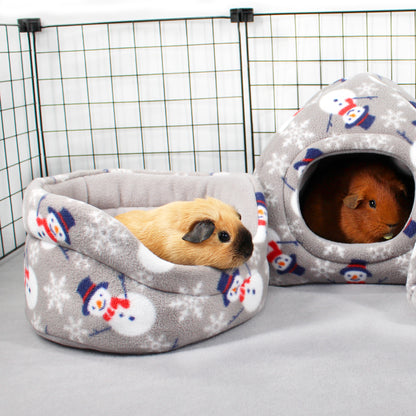 Two small animals in gray pet beds with snowman pattern on a white background