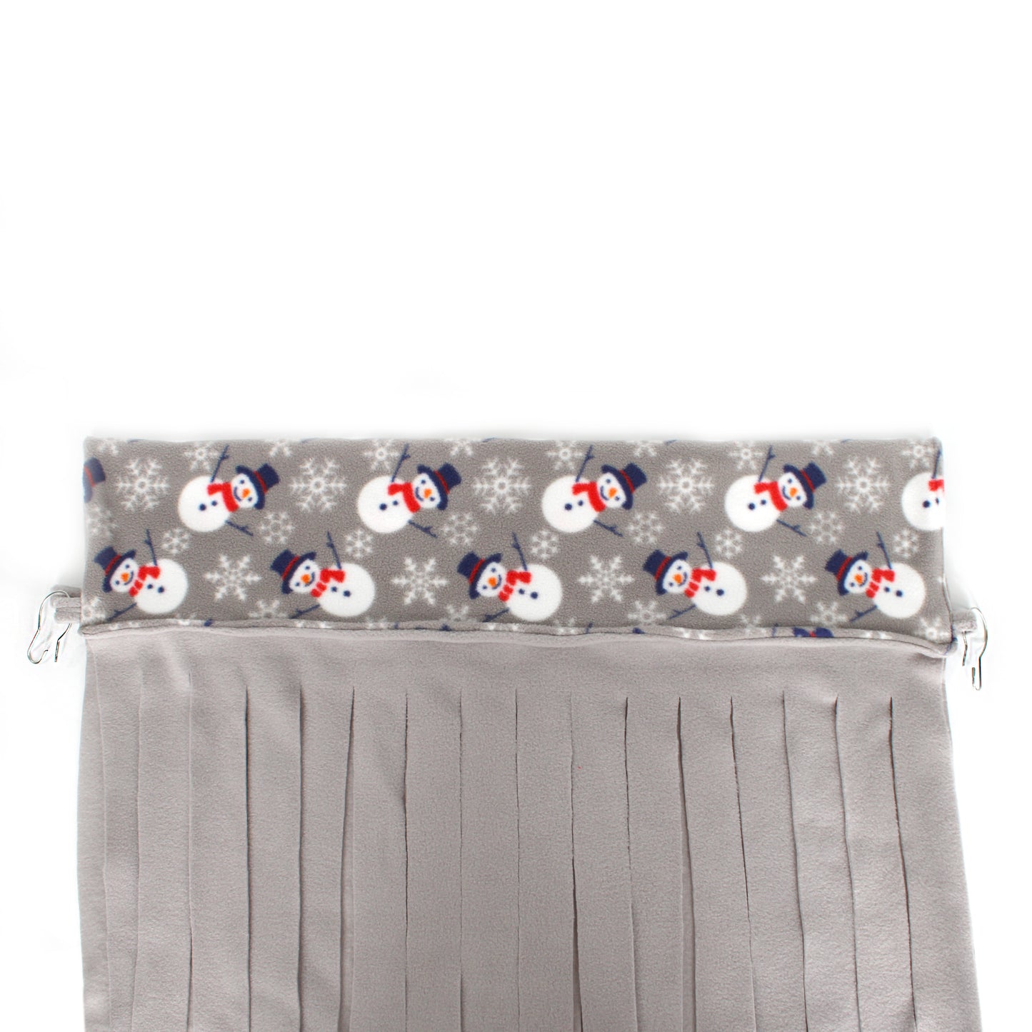 Gray pleated curtain with snowman pattern on top