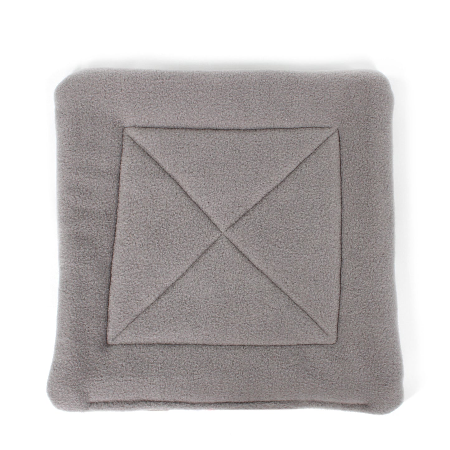 Gray blanket with a diamond pattern on a white background