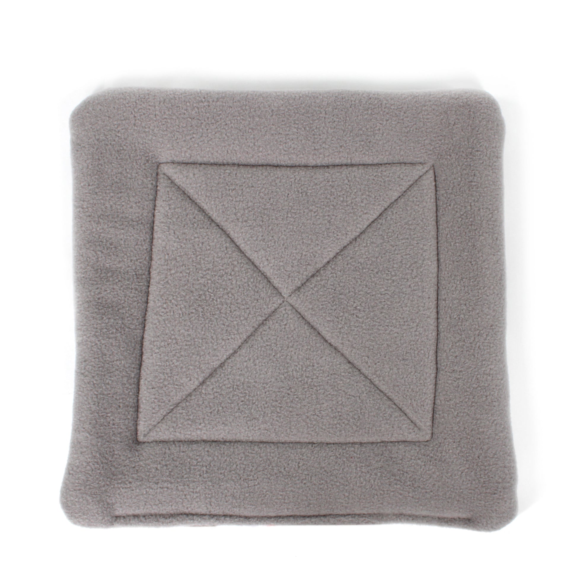 Gray blanket with a diamond pattern on a white background