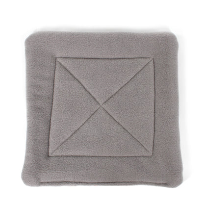 Gray blanket with a diamond pattern on a white background