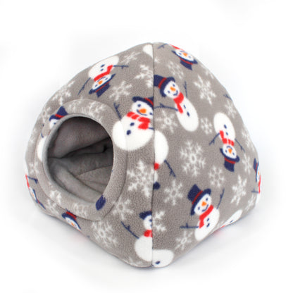 Pet bed with snowman pattern on a gray background
