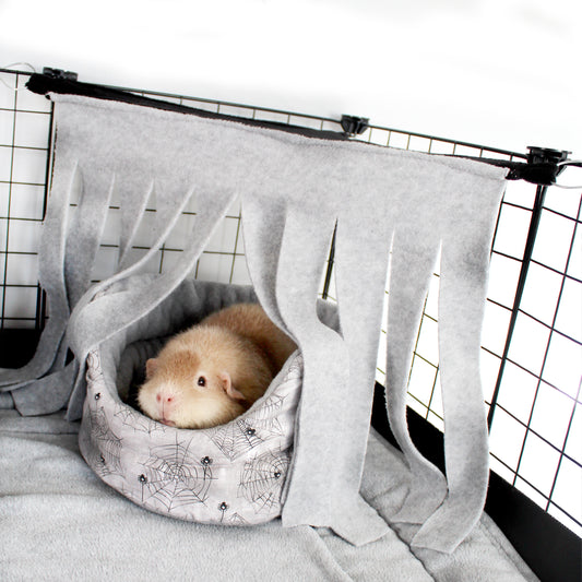 Grey and Black Corner Fleece Forest, over the top of a cuddle cup to create an extra cozy hideout for guinea pigs