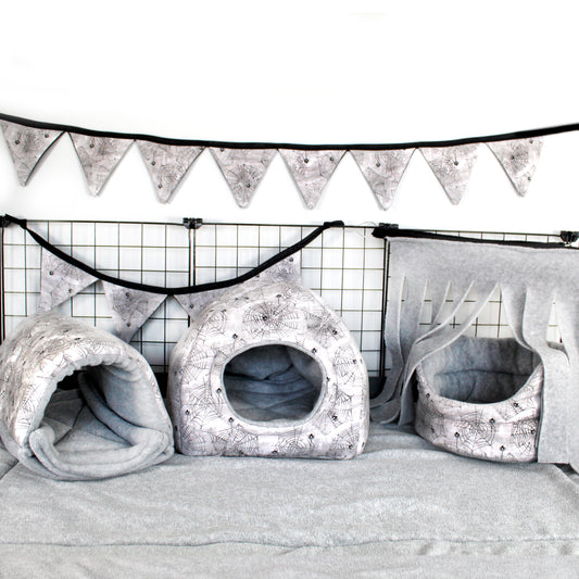 Halloween spider fleece guinea pig accessories, example of what a cage with all the accessories would look like