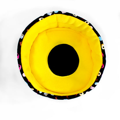 Pair Of Liquorice Allsorts Pee Pads, top view showing the pee pad fitting snugly inside a cuddle cup bed