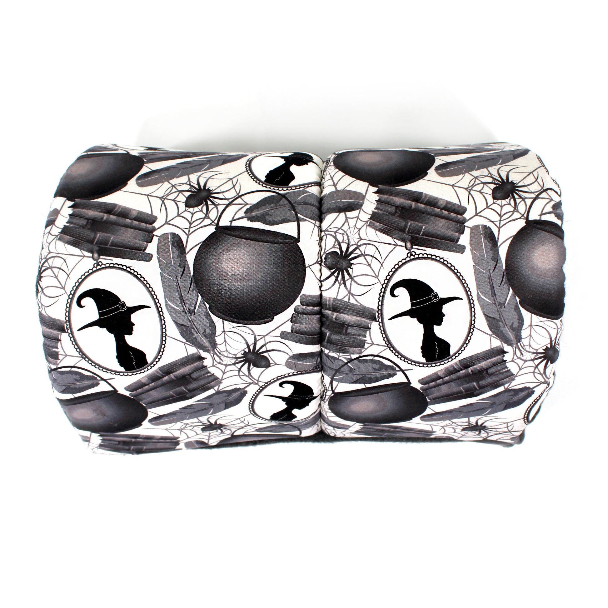 Halloween-themed guinea pig tunnel with black cauldrons, witch hats, and spider webs on a white background
